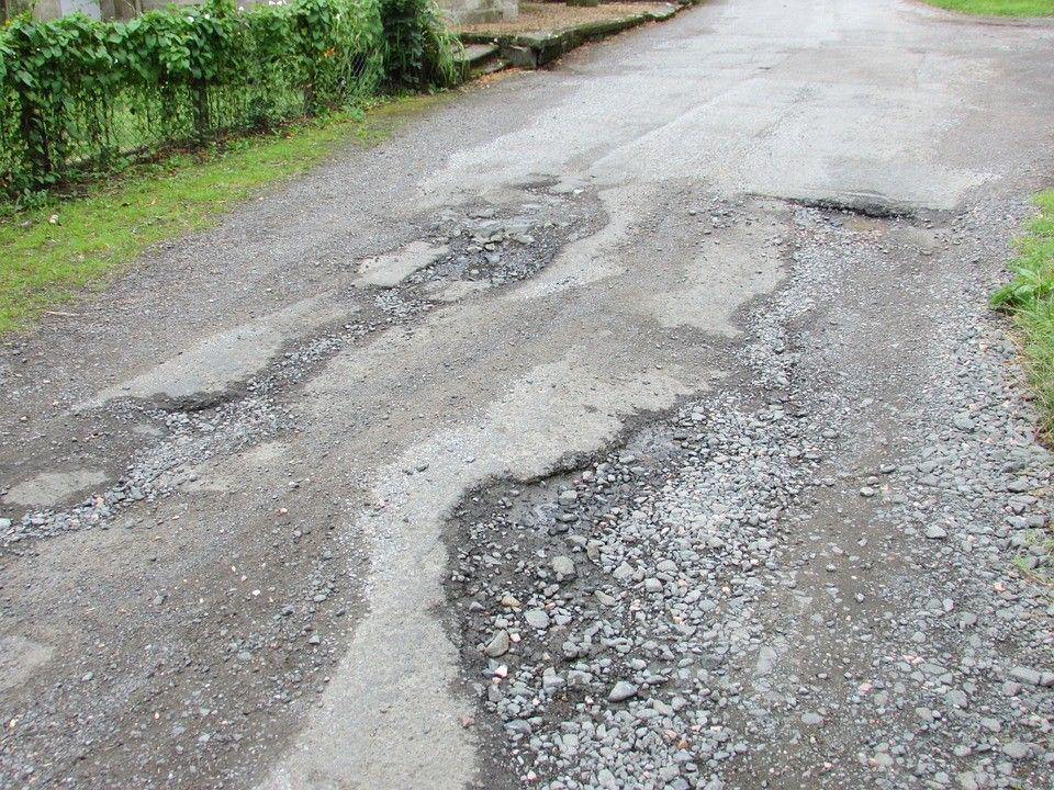[Puisi] Di Atas Jalan Berlubang