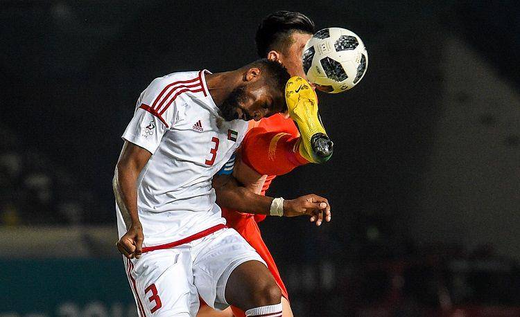 Timnas Uni Emirat Arab (seragam putih) saat melawan China. ANTARA FOTO/INASGOC/Raisan Al Farisi