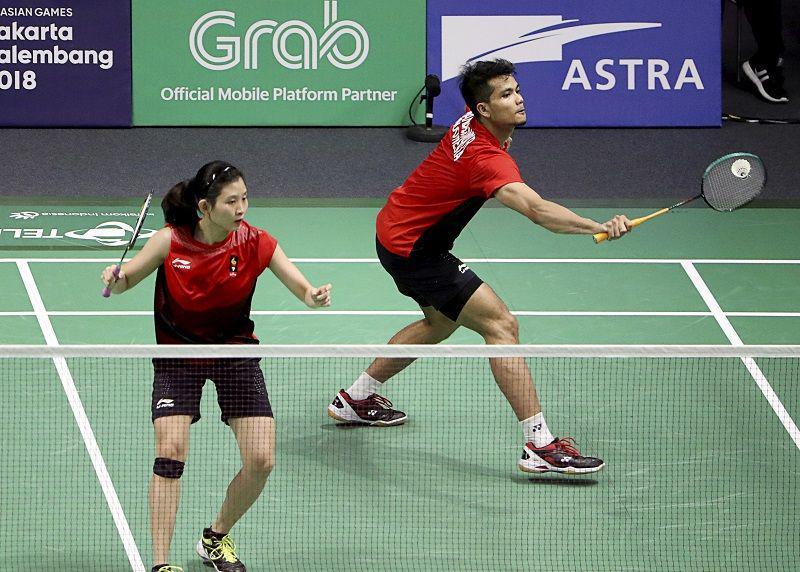 (Pebulu tangkis ganda campuran Indonesia Ricky Karanda Suwardi (kanan) dan Debby Susanto (kiri)) ANTARA FOTO/INASGOC/Jessica Margaretha