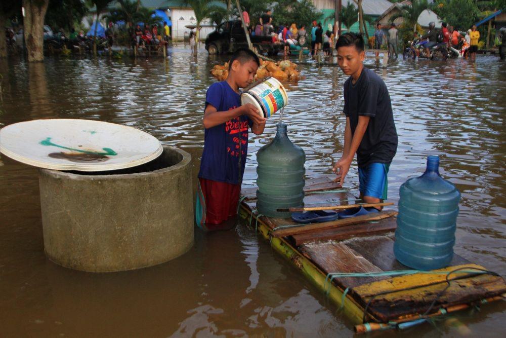 FOTO: Banjir di Sulawesi Tenggara, Pengungsi Capai 18 Ribu Orang