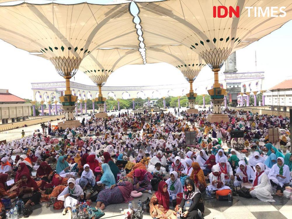 Mampu Tingkatkan Daya Ingat, Ribuan Orang Baca Alquran Tartil di MAJT