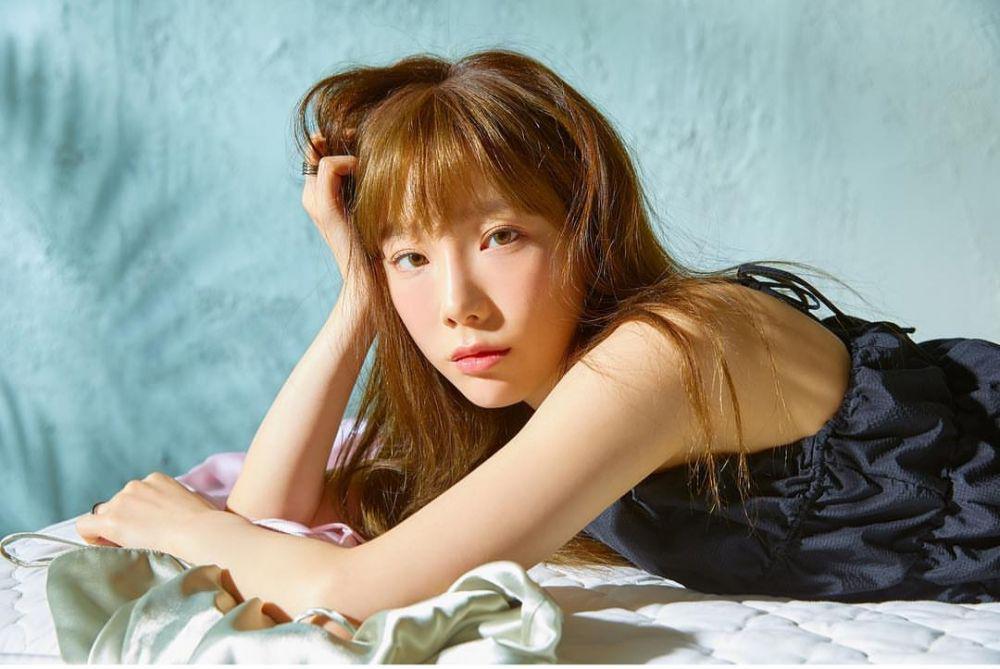Menggemaskan, Ini 12 Gaya Berfoto Taeyeon yang Aneh tapi Lucu!