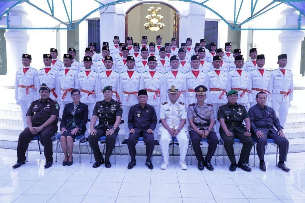 Plt Bupati Asahan Kukuhkan Pasukan Pengibar Bendera