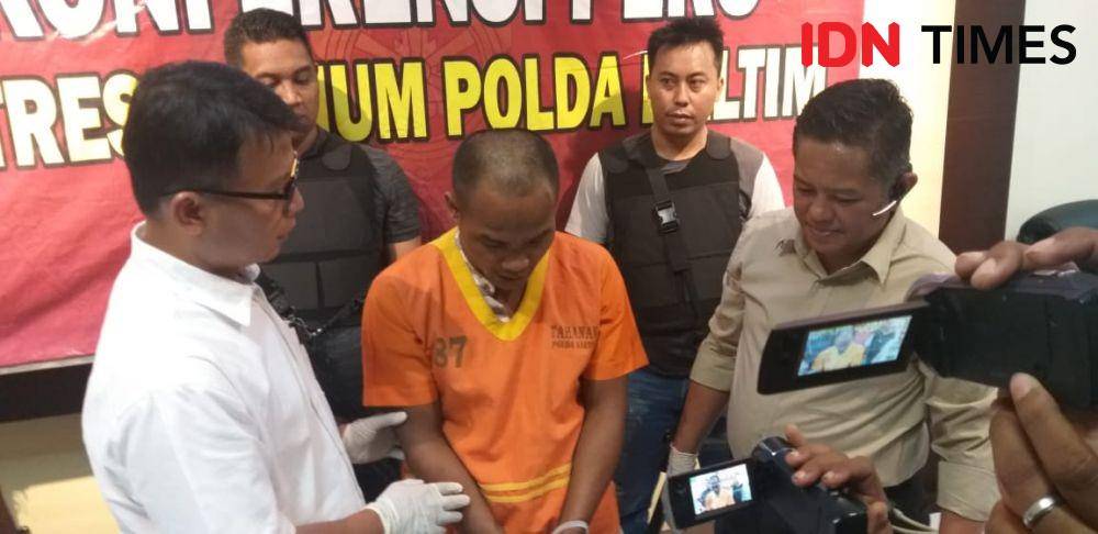 Tersangka pencurian 20 TKP di Balikpapan, Edi Susanto (baju orange), diperiksa jajaran Polda Kaltim. IDN Times/Surya Aditya
