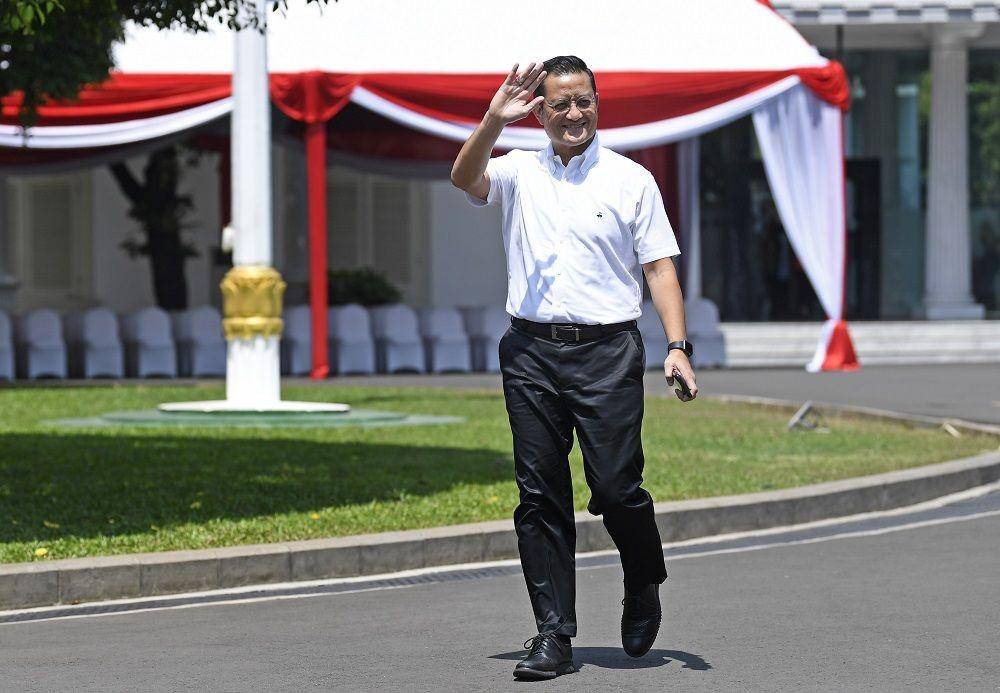 (Juliari Batubara tiba di Kompleks Istana Kepresidenan di Jakarta, Selasa (22/10/2019). ANTARA FOTO/Puspa Perwitasari
