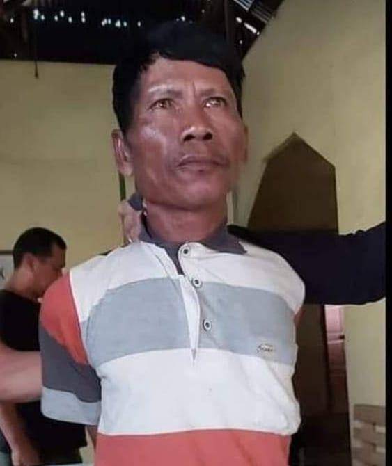 AM (56) pelaku pemerkosa TR (12) saat digelandang di Polresta Padang (Dok. Istimewa)