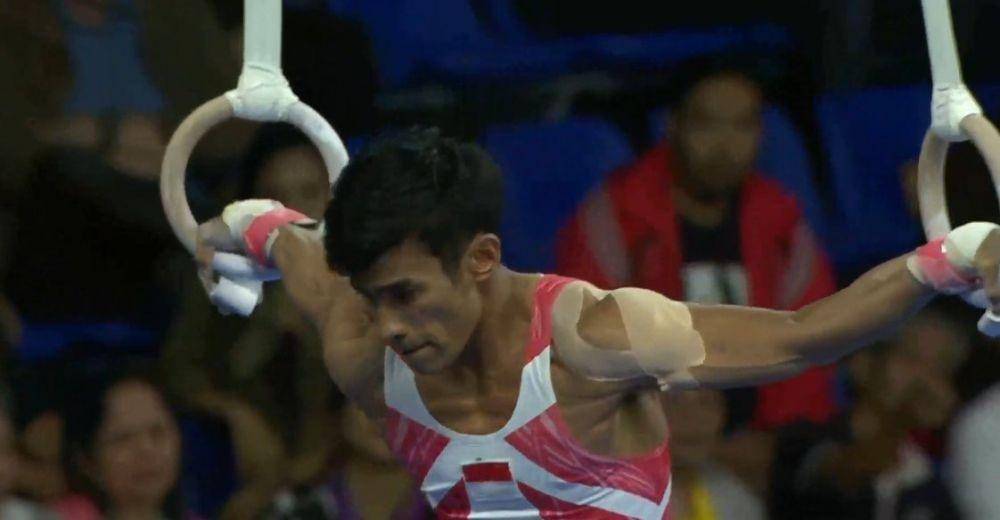 Dwi Samsul Arifin berlaga di SEA Games 2019 cabor gymnastic. Twitter/@BadmintonTalk