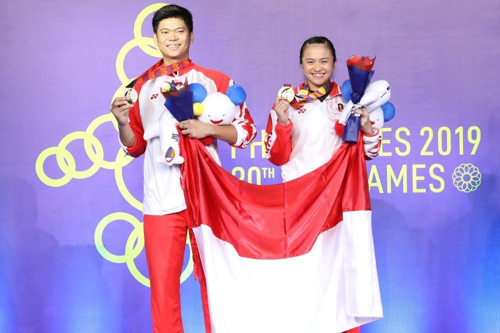 Praveen Jordan/Melati Daeva di pengalungan medali SEA Games 2019. Dok. IDN Times/PBSI