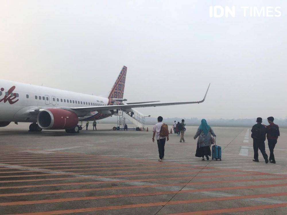 Penerbangan dari Bandara SMB II Palembang.