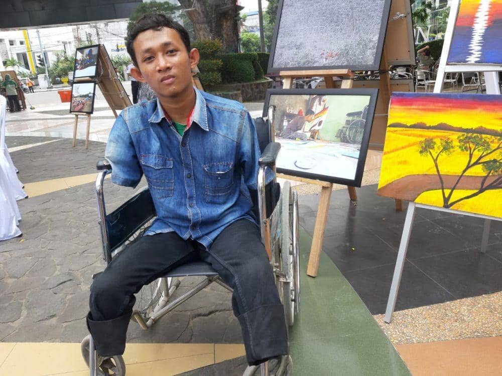 Seorang disabilitas ikut serta dalam acara puncak HUT PFI
