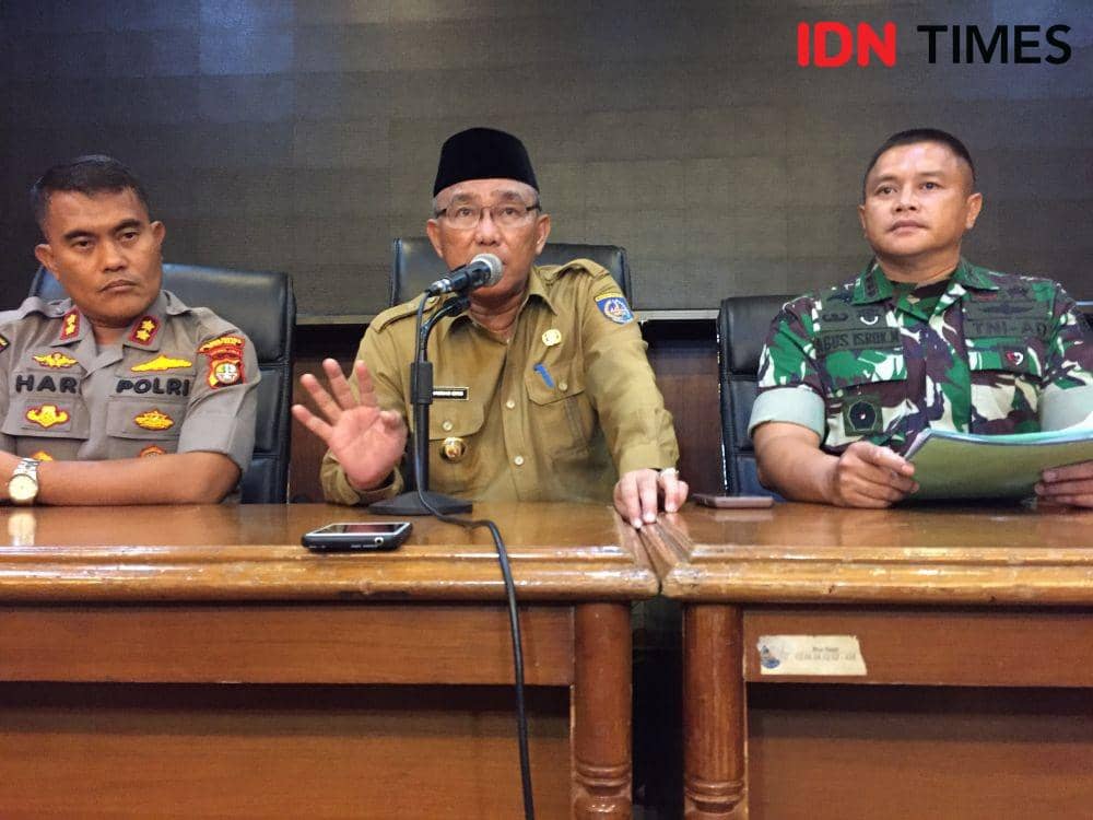 Wali Kota Depok, Mohammad Idris dalam konferensi pers terkait situasi terkini virus corona (IDN Times/Rohman Wibowo)