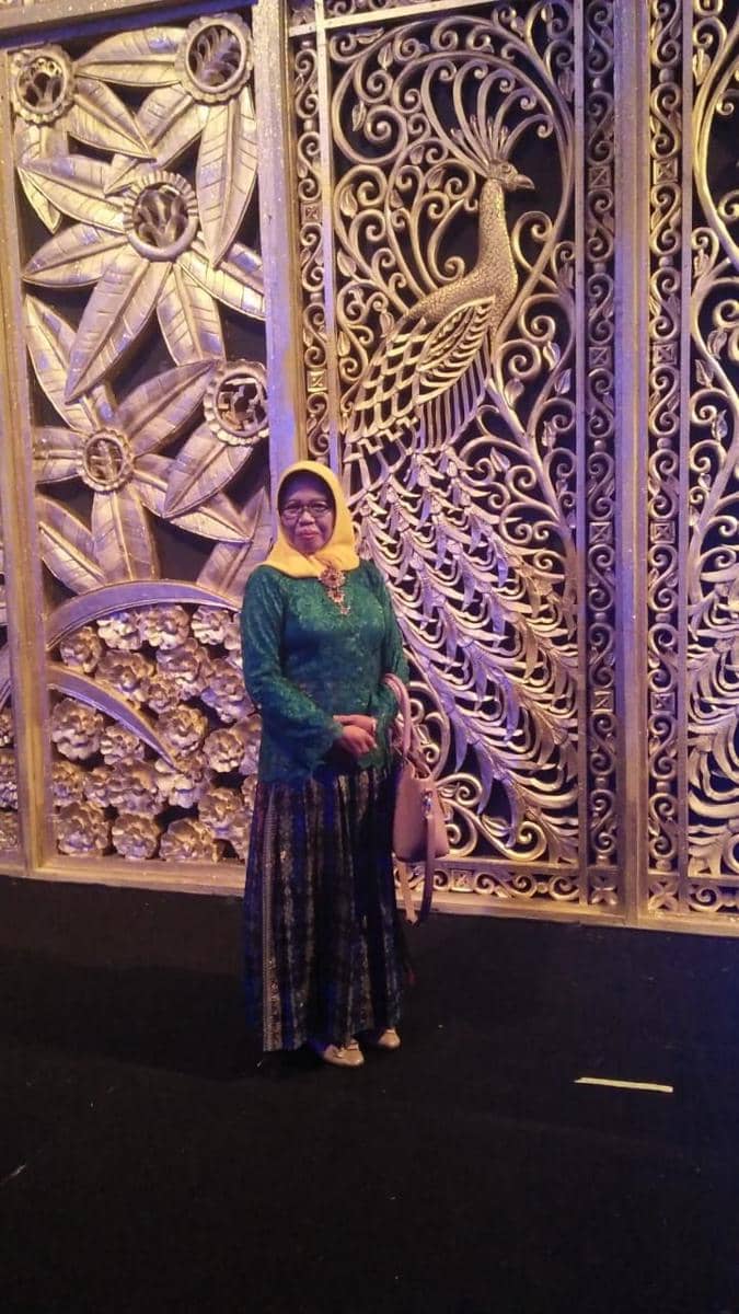 Elly Krismiani harus menunda keberangkatan ibadah haji tahun ini. Elly Krismiani for IDN Times