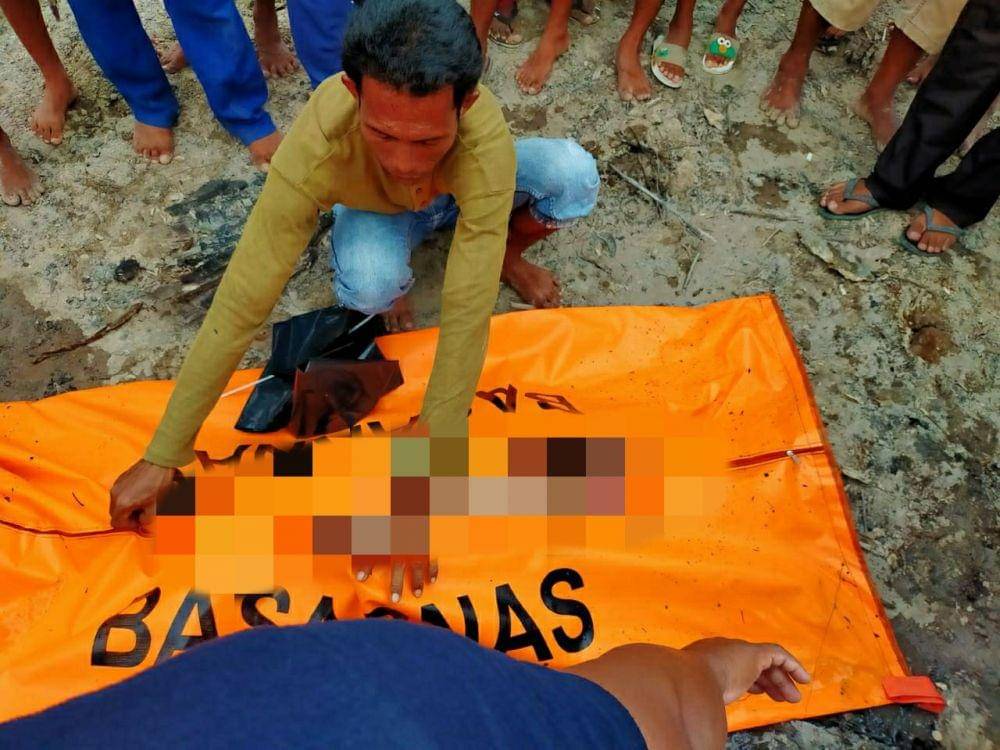 Korban dievakusi setelah dikeluarkan dari tubuh buaya (Dok.Basarnas Tarakan/Istimewa)
