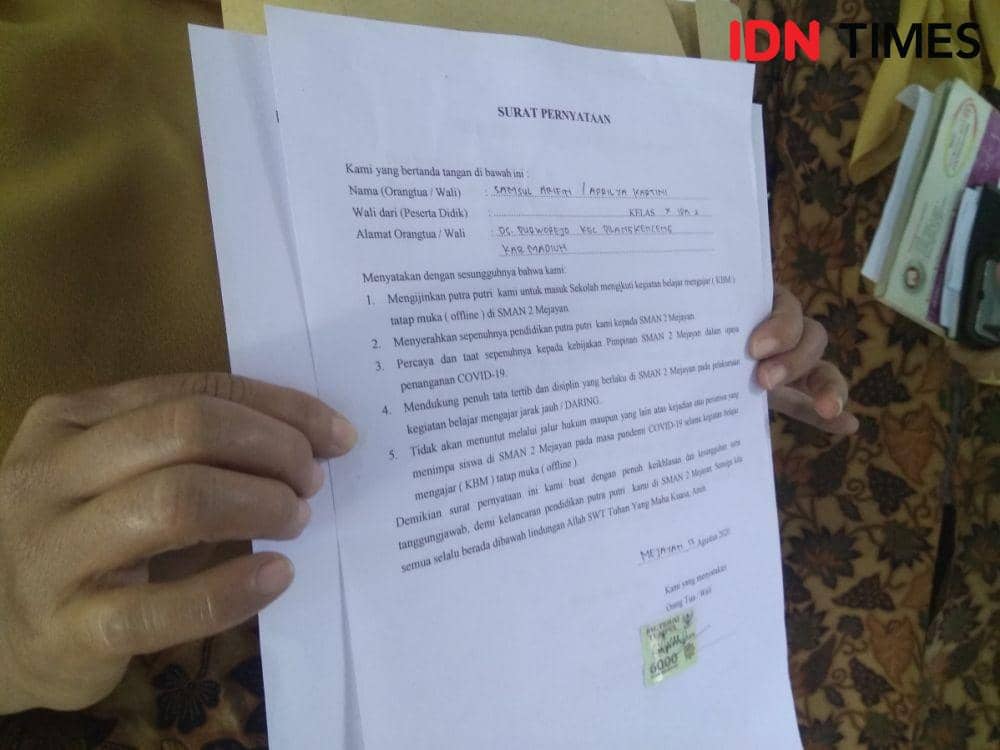 Surat pernyataan dari orang tua/wali murid tentang kegiatan belajar mengajar secara tatap muka di tengah pandemik COVID-19. IDN Times/Nofika Dian Nugroho