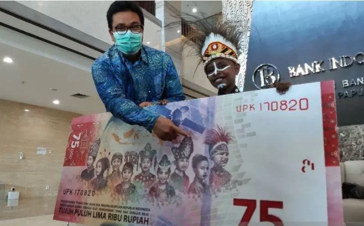 Ternyata Ini Anak Laki-laki Papua yang Ada di Uang Baru Rp75 Ribu!