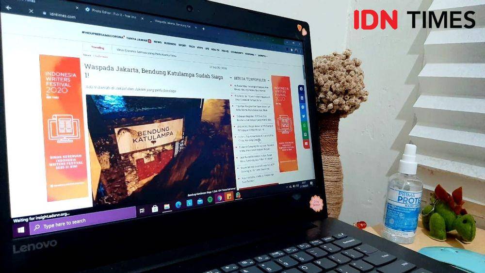 Ilustrasi membaca artikel (IDN Times/Besse Fadhilah)