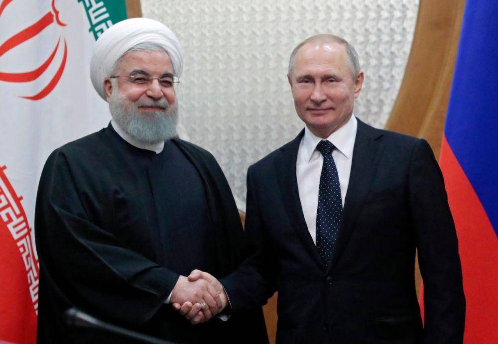 Pemimpin Iran, Hassan Rouhani dan Presiden Rusia, Vladimir Putin saat keduanya bertemu. twitter.com/mfa_russia