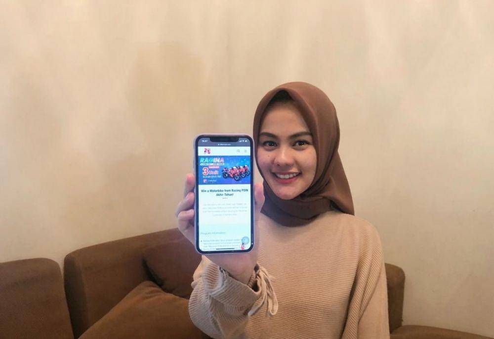 Program RAGINA cukup mengumpulkan kupon undian yang didapat melalui penukaran 20 Telkomsel POIN . Program ini akan berlangsung hingga 31 Desember 2020. (IDN Times/Istimewa)