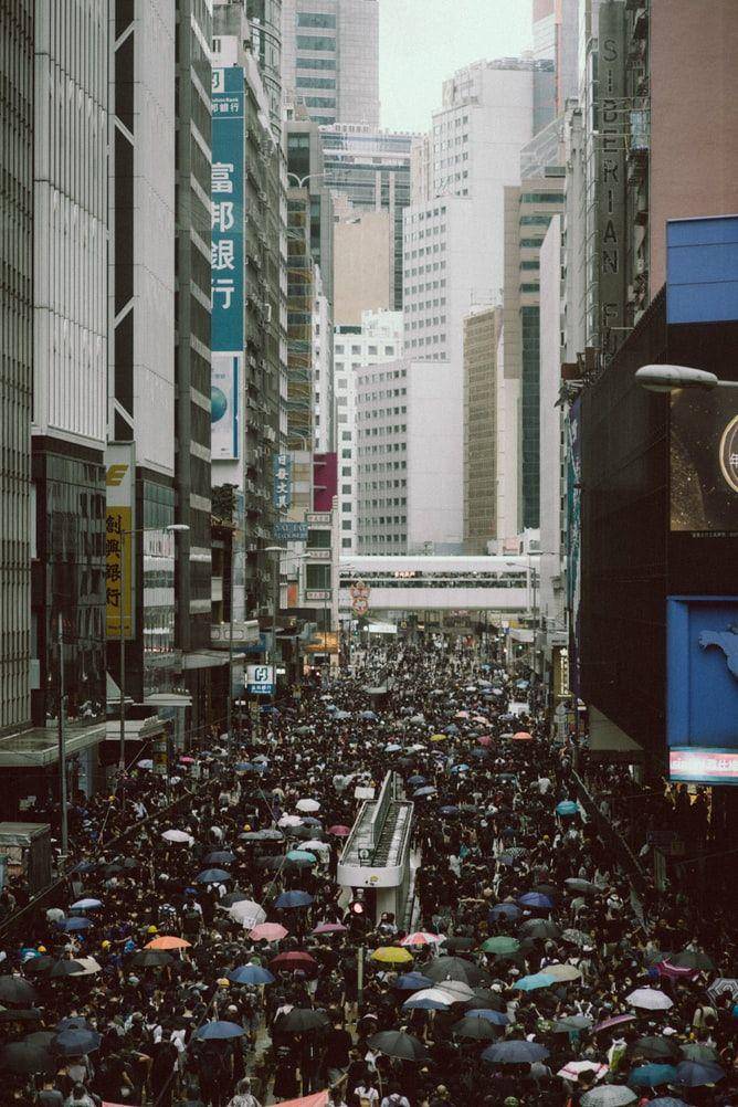 Foto warga Hong Kong yang melakukan demonstrasi revolusi payung. Sumber: unsplash.com/ Joseph Chan
