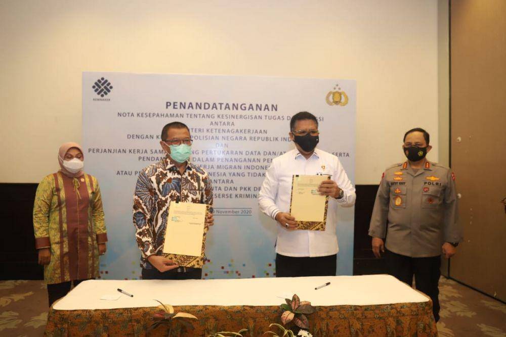 Penandatanganan nota kesepahaman Kemnaker dan Polri. Dok. Kemnaker