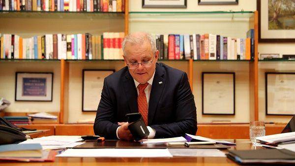 Perdana Menteri Australia, Scott Morrison, saat sedang mengerjakan tugas kenegaraan. (Twitter.com/ScottMorrisonMP)