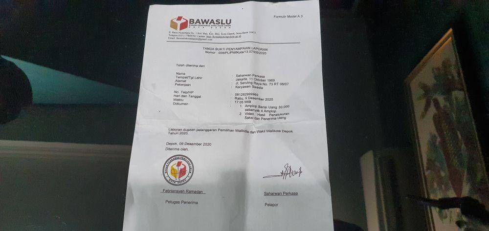 Surat penerimaan laporan yang diberikan Bawaslu Kota Depok kepada kuasa hukum Pradi-Afifah, (IDNTimes/Dicky)