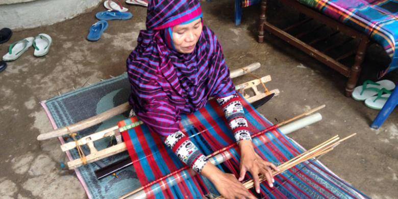 kain tembe (kompas)
