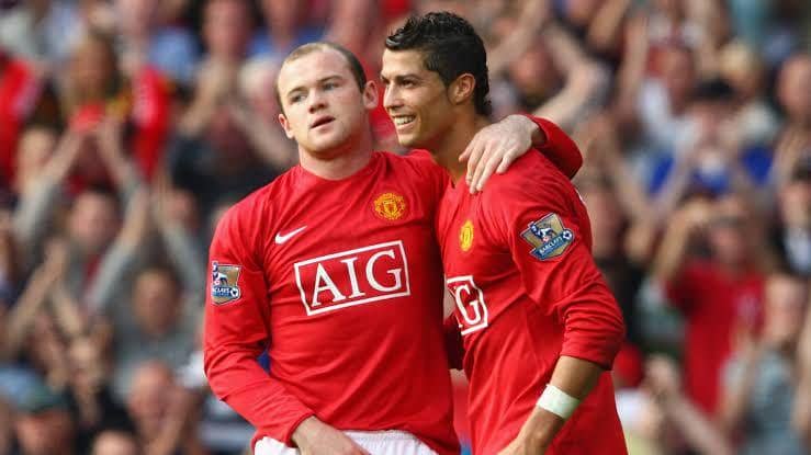 Wayne Rooney dan Cristiano Ronaldo (goal.com)