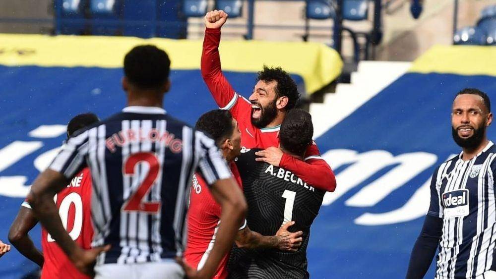 Instagram @liverpoolfc / Kiper Liverpool, Alisson Becker, merayakan gol bersama Mohamed Salah