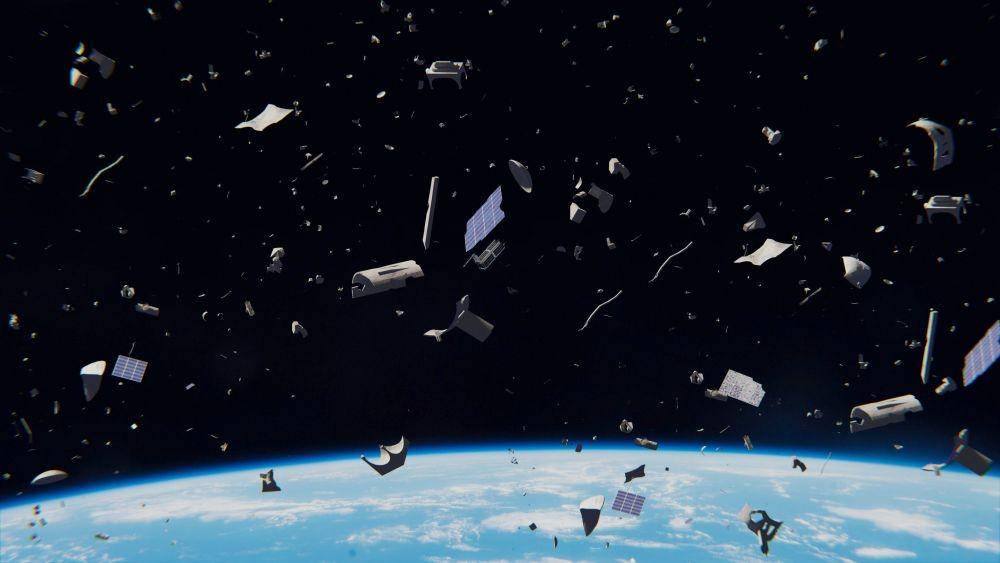 reruntuhan satelit di luar angkasa (phys.org)