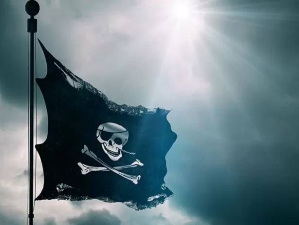ilustrasi - Bendera tengkorak bajak laut melambai tertiup angin, simbol bajak laut. ANTARA/Shutterstock/pri.