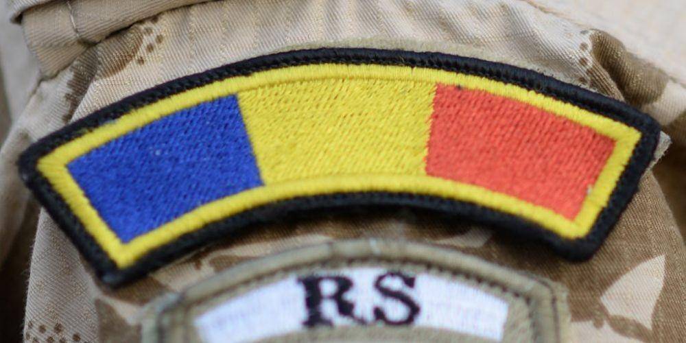 Lambang Bendera Romania dan RS (Resolute Support) yang merupakan misi NATO di Afghanistan. twitter.com/ResoluteSupport