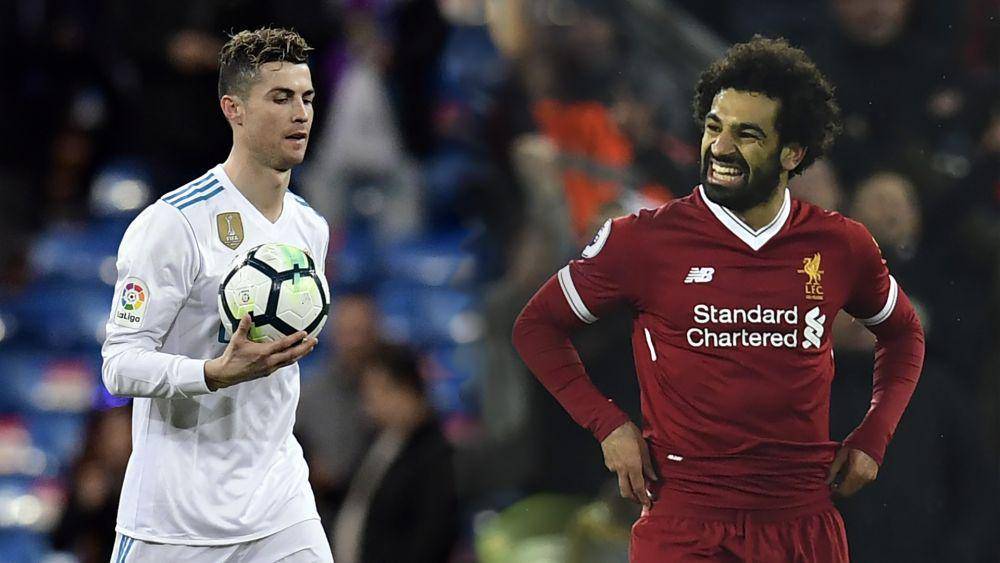 Mohamed Salah dan Cristiano Ronaldo (goal.com)