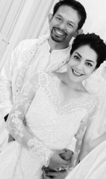Momen Lulu Tobing dan suami (instagram.com/banimmulia)