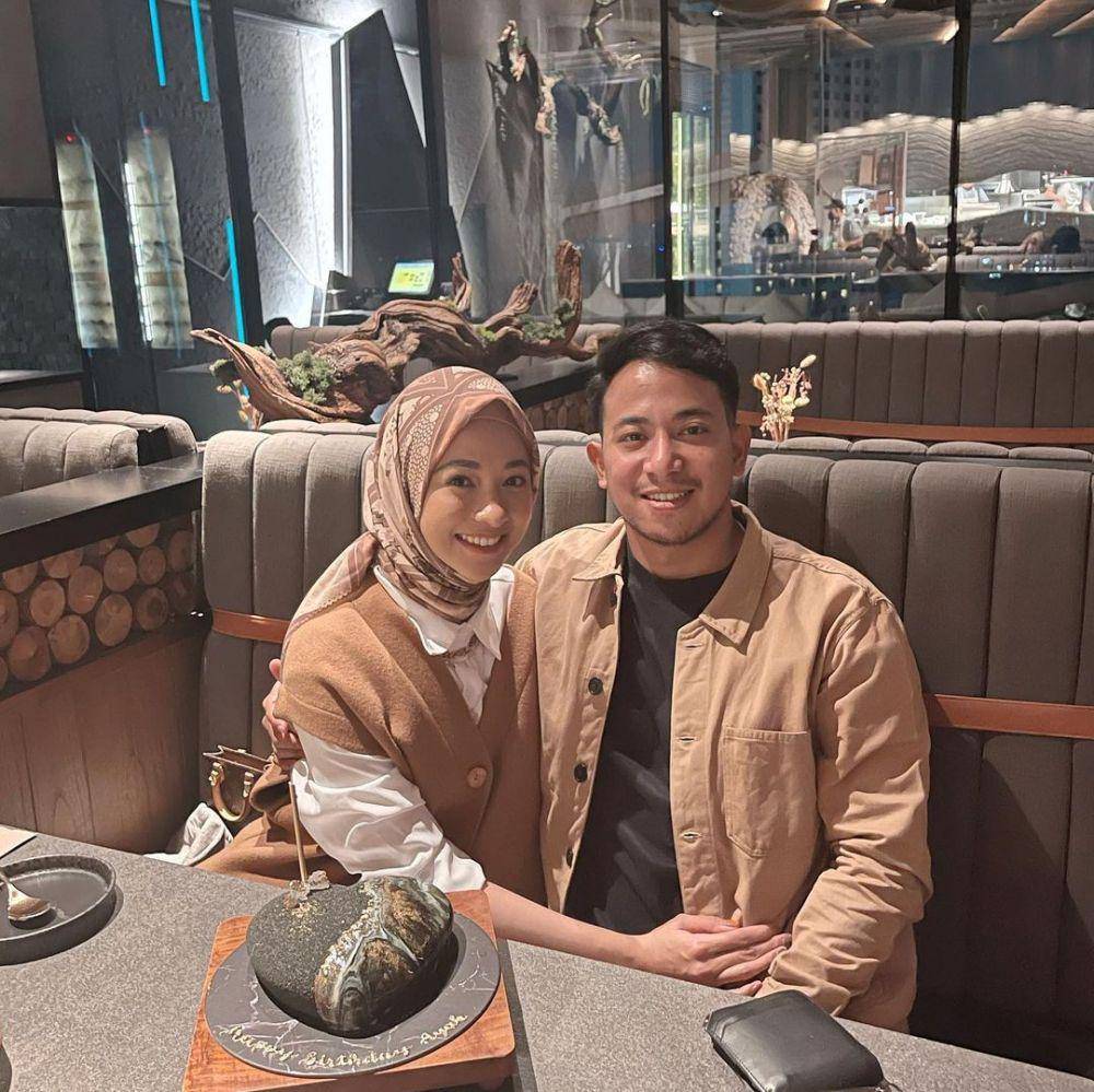 Poppy Bunga dan suami (instagram.com/poppybungariphat)