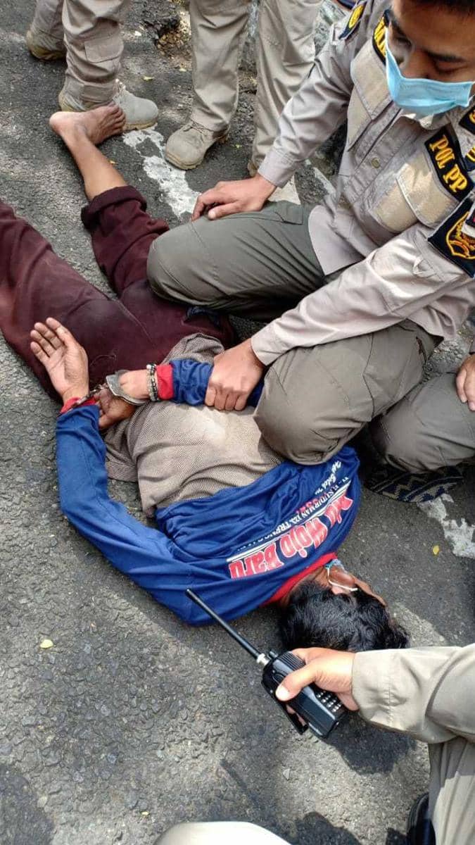 Pelaku saat ditangkap polisi. IDN Times /istimewa