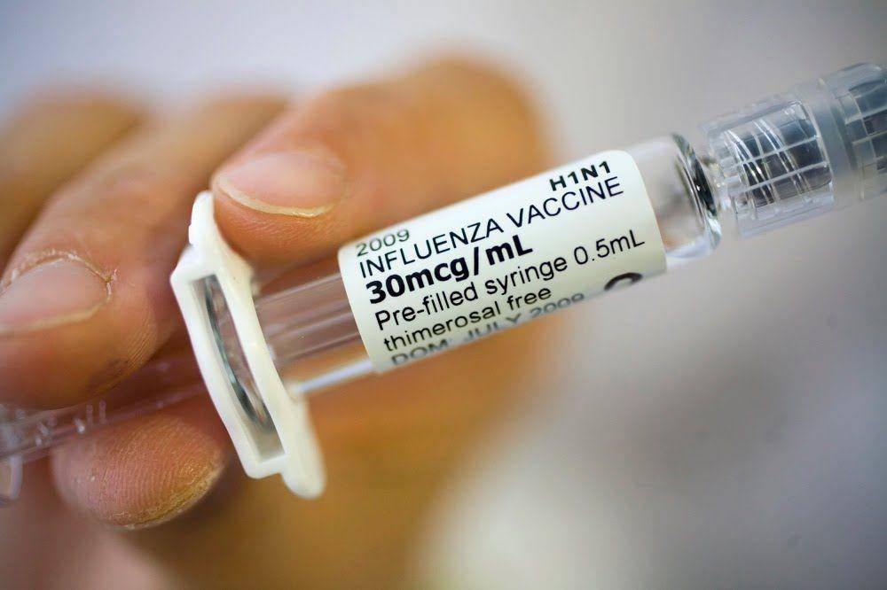 ilustrasi vaksin influenza (msnbc.com/John Brecher)