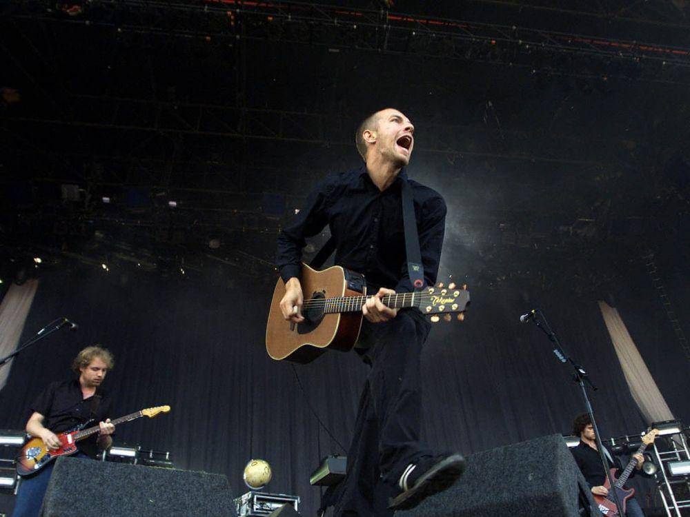 Gaya busana Chris Martin (theguardian.com)