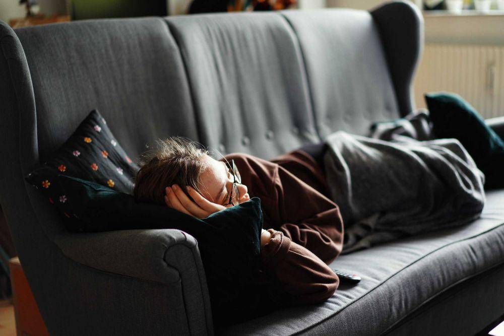 Ilustrasi orang sedang tidur (Unsplash/Adrian Swancar)