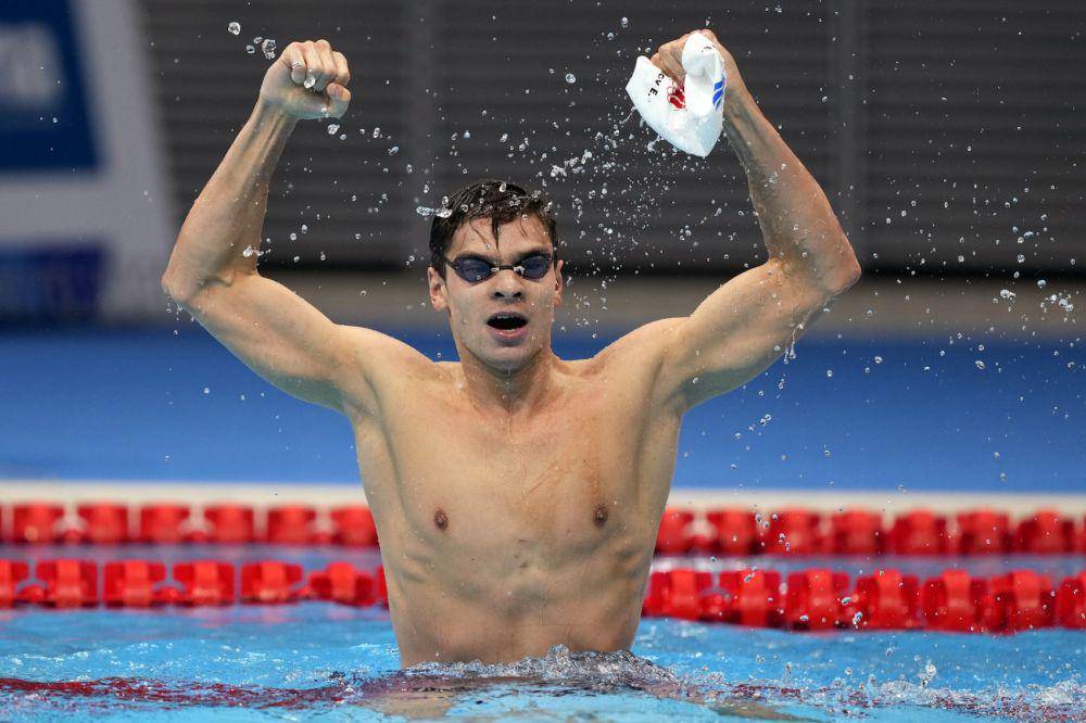 Evgeny Rylov, perenang Rusia meraih medali emas nomor 100 meter gaya punggung putra. (japantoday.com)