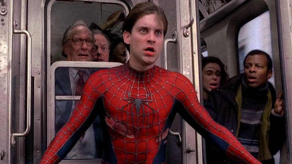 potret Tobey Maguire dalam scene ikonik Spiderman (gamesradar.com)