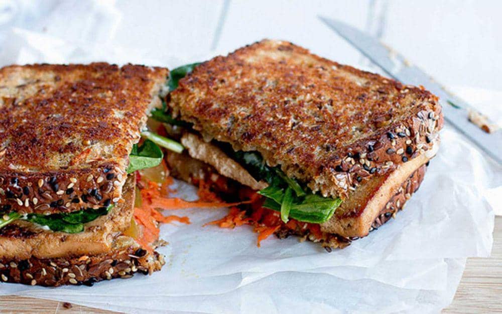 Grilled marinated tofu sandwich (onegreenplanet.org)