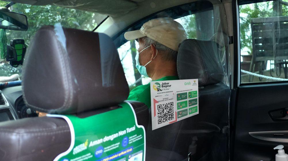 Semangat Berbagi, Grab Mudahkan Donasi Lewat Fasilitasnya