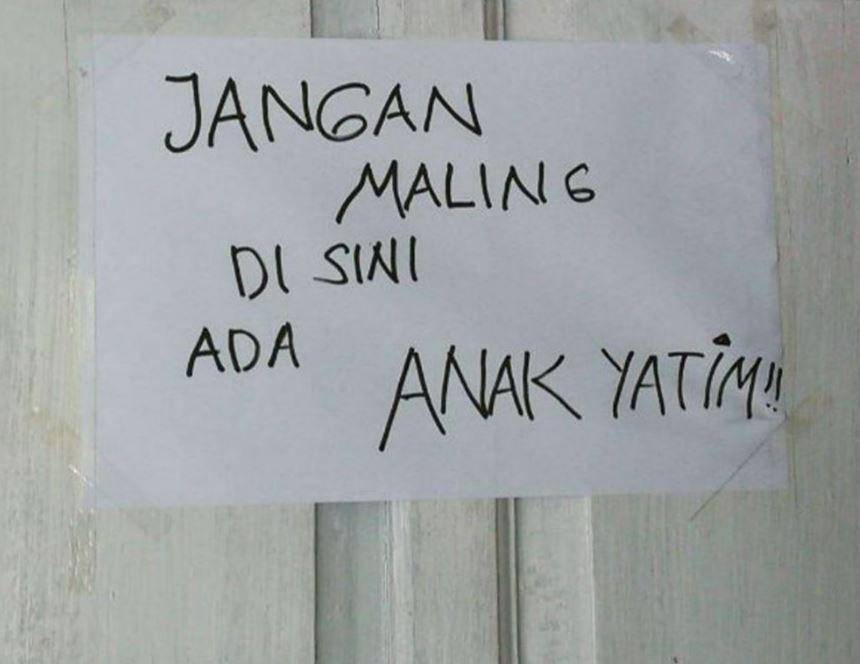 tulisan dilarang maling (1cak.com)