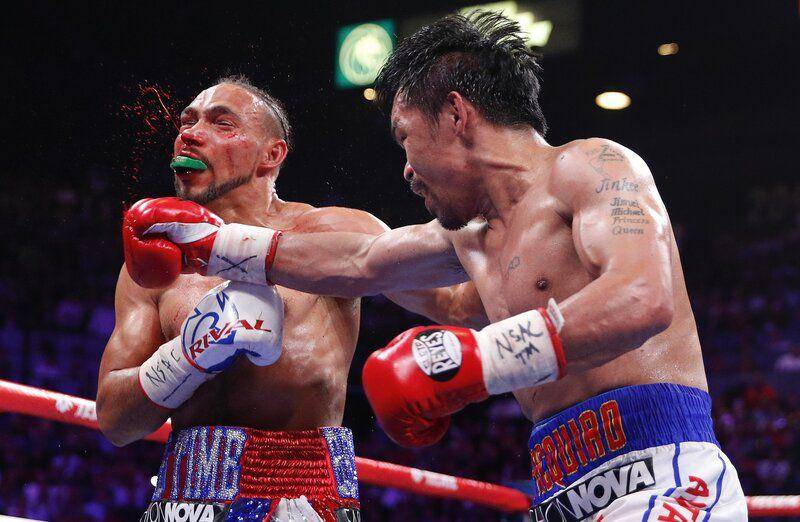 Pacman vs Keith Thurman (apnews.com)