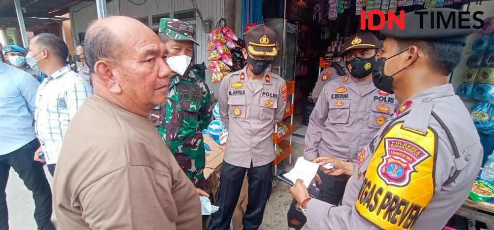 Pembongkaran kios pedagang ilegal di Samarinda Kalimantan Timur, Selasa (14/9/2021). (IDN Times/Nina)