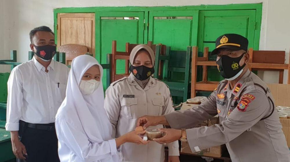 Polres Tanggamus kembali melaksanakan vaksinasi keliling di wilayah Kecamatan Sumberejo. (IDN Times/Istimewa).