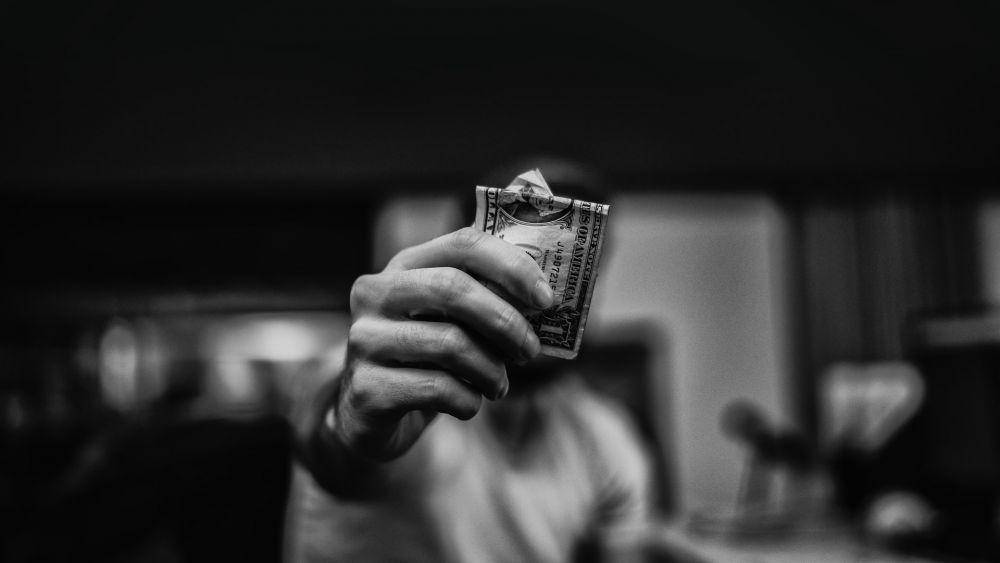 ilustrasi uang (unsplash.com/Iucas Favre)