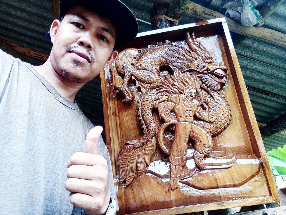 ukiran kayu (instagram.com/iqbal_art_sawarna)