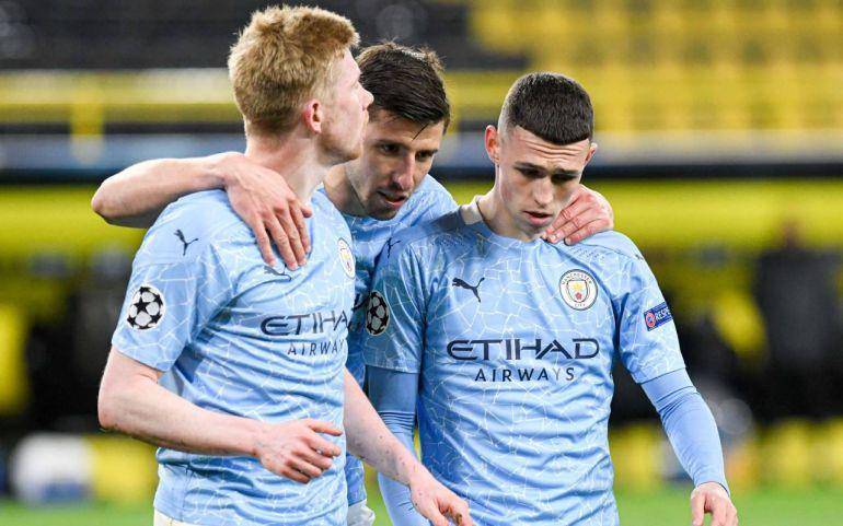 potret Kevin De Bruyne, Ruben Dias, dan Phil Foden (benchwarmers.ie)